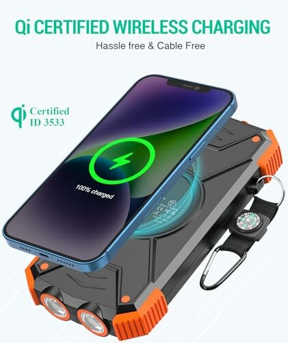 Qi certified wireless charging device with phone and compass.