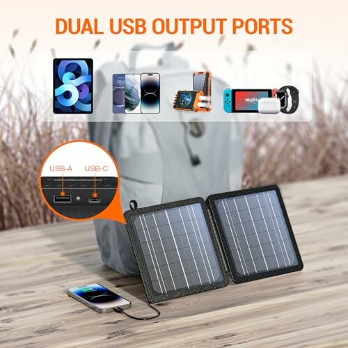 Portable solar charger with dual USB ports connected to a smartphone.